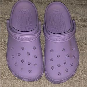 Lavender crocs , scrape mark on left croc